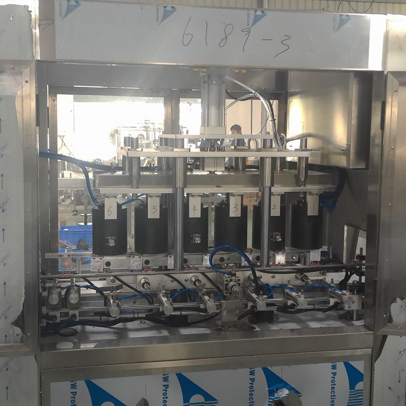 Embalaje de plástico Máquina automática de tapón de vacío de alta velocidad para frascos de vidrio de 6 cabezas