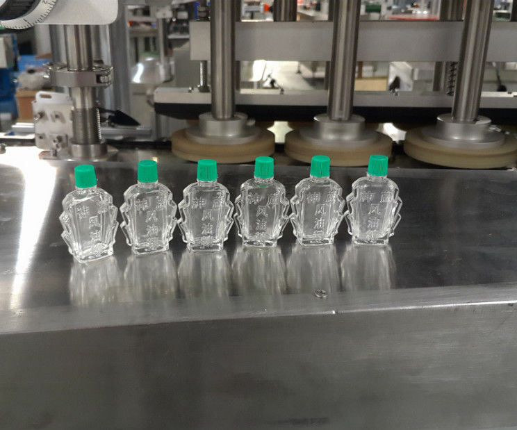 Máquina de tapa de botellas de vidrio de pequeña capacidad para aceite esencial y tapa de aceite medicado