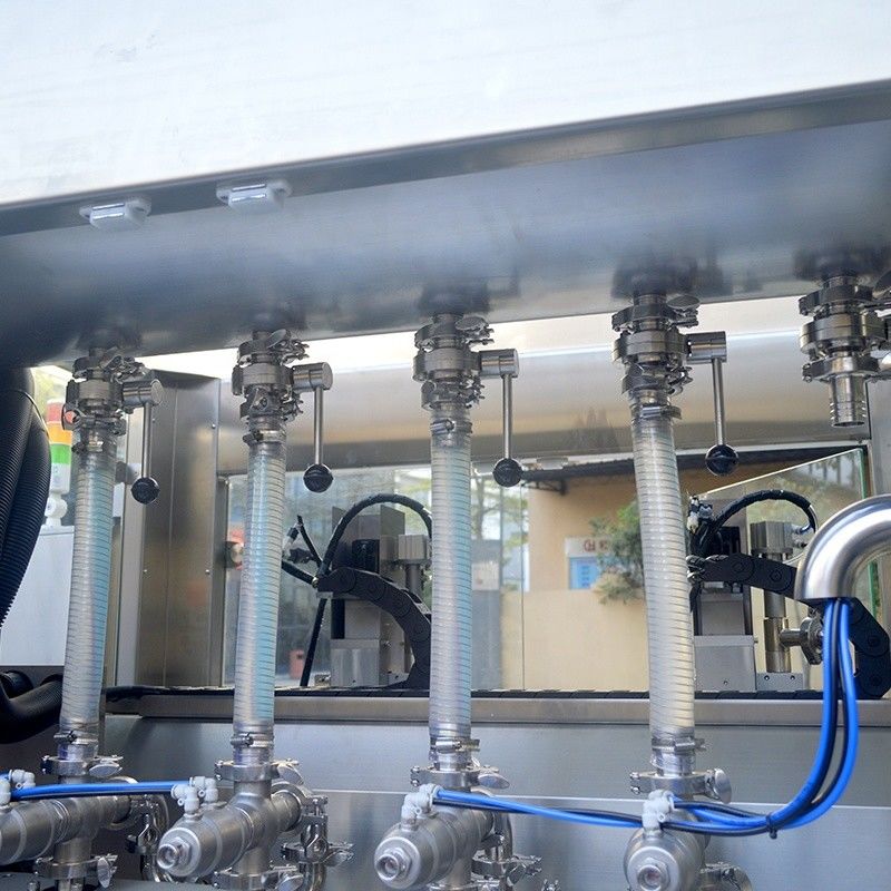 Máquina de llenado de aceite lubricante y champú líquido con doble cabeza de seguimiento